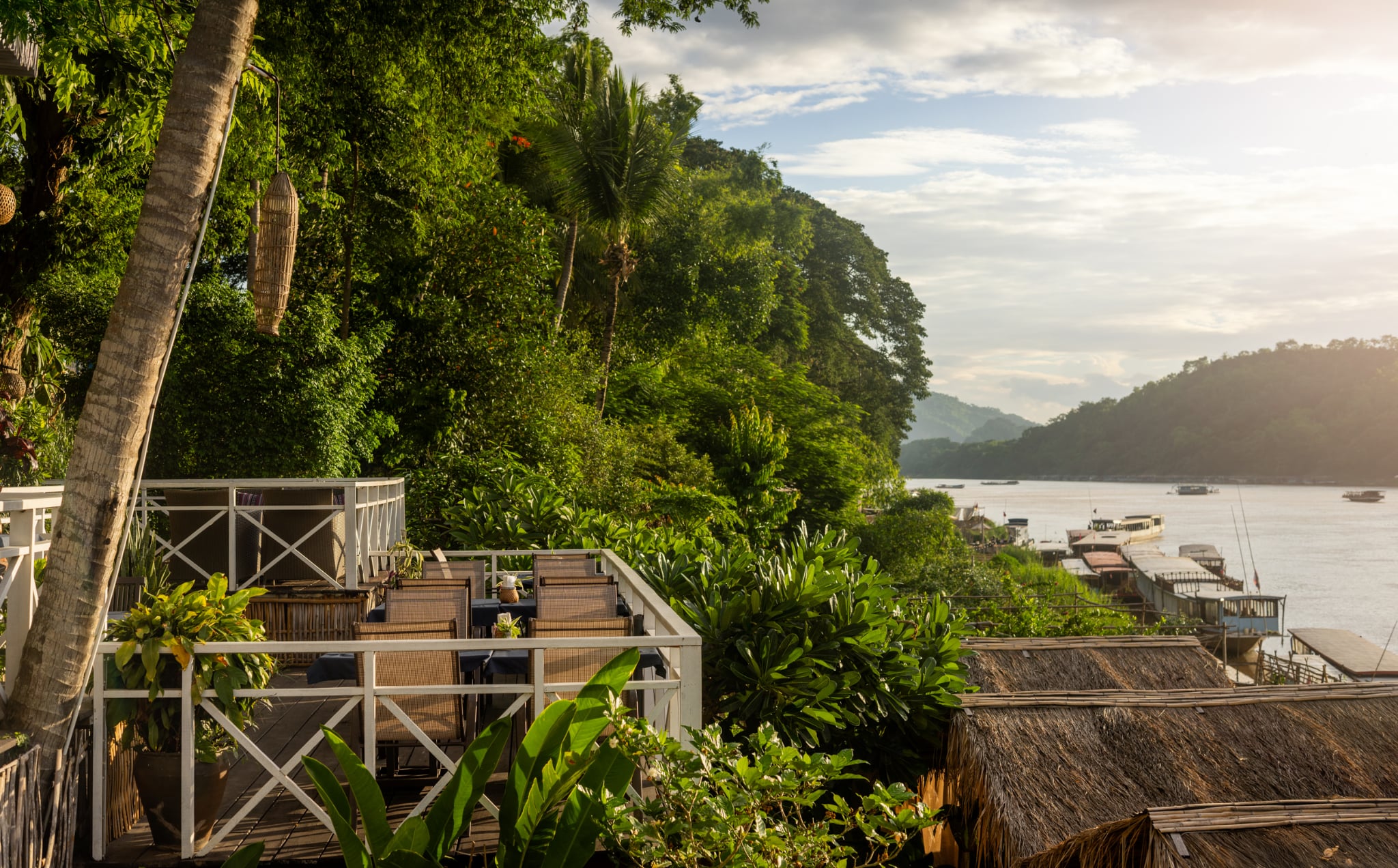Tables by the water at The Belle Rive Terrace