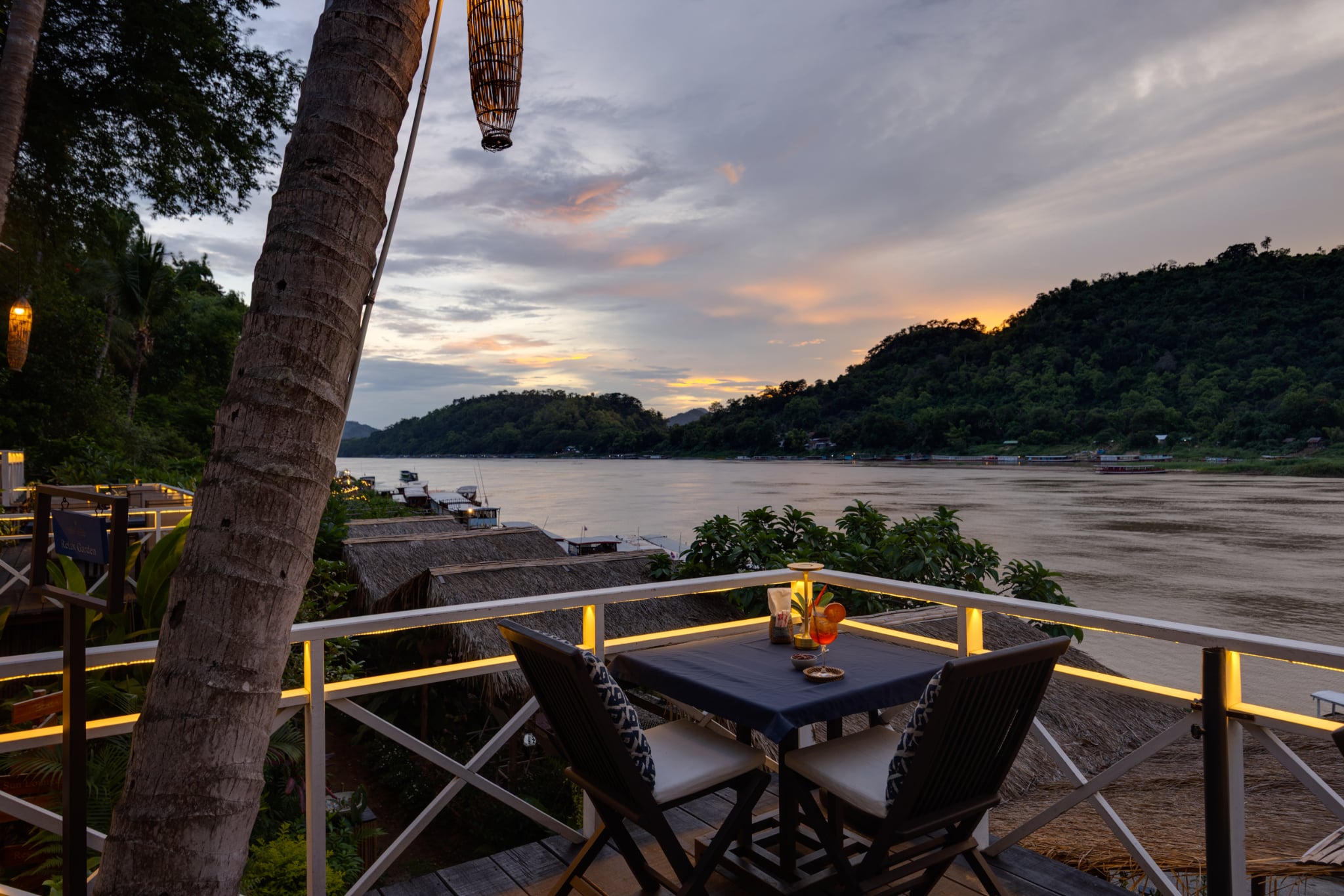 The terrace and the river at dusk